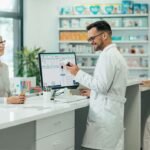 Pharmacist managing medicine stock with Pharmacy 360 software